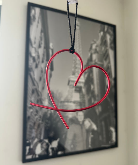 Hanging heart on black string
